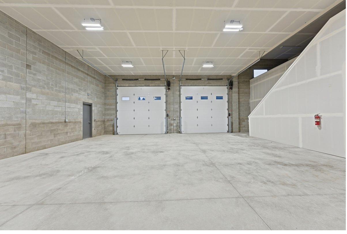 Interior warehouse bay with roll-up doors